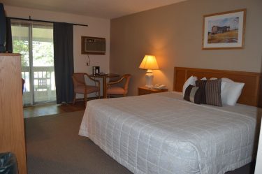 One king size bed, full bath with shower in bathtub, cable television, dresser, night stand and mirror. Enjoy the outdoors on the semi private patio/deck.